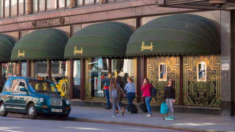 Harrods owners bank £180m dividend despite dip in profits